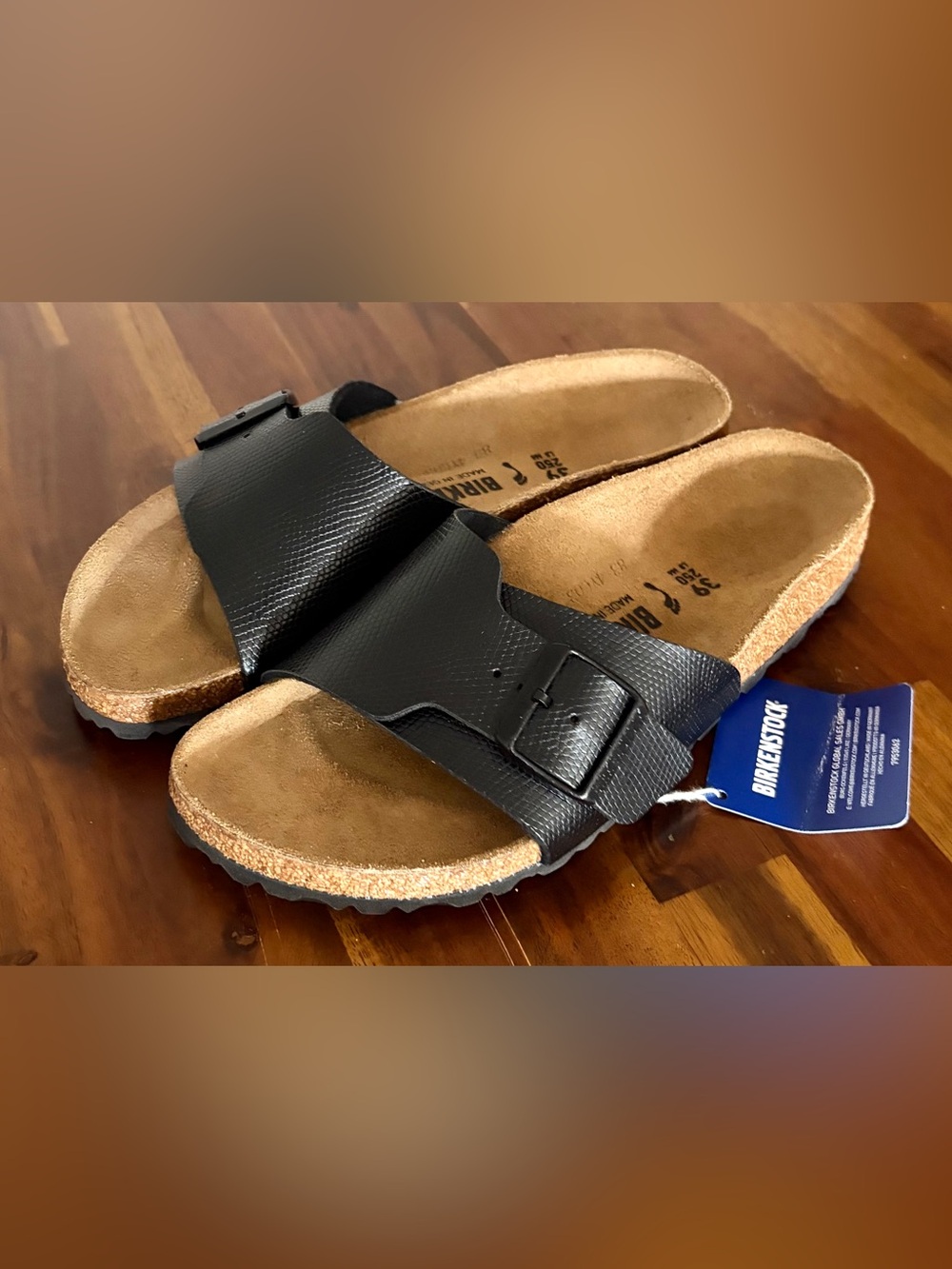 Birkenstock  women’s Black Single Strap Madrid Slide Sandals